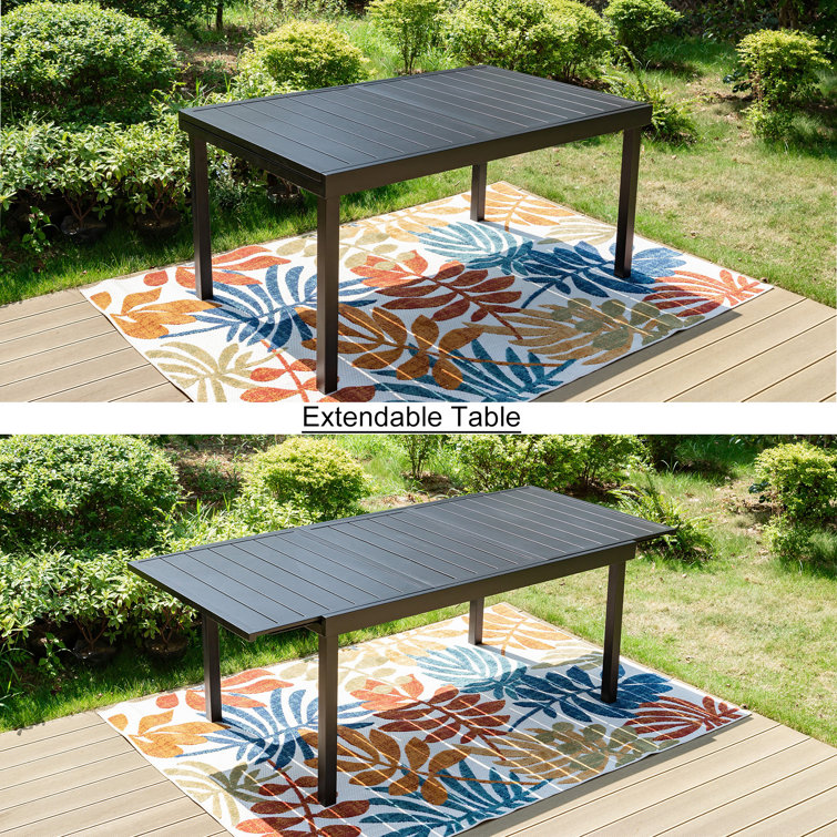 Retractable outdoor dining online table